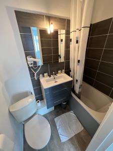 Koupelna v ubytování Hotel Joly