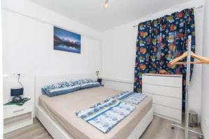 Ένα ή περισσότερα κρεβάτια σε δωμάτιο στο Dubrovnik cute little corner apartment
