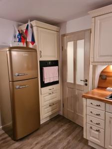 A kitchen or kitchenette at Apartment Soul Duša