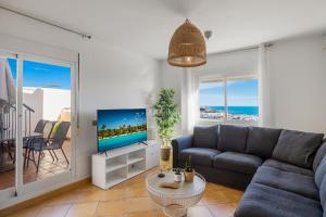 Televízia a/alebo spoločenská miestnosť v ubytovaní Casa Rosado - Duplex Penthouse
