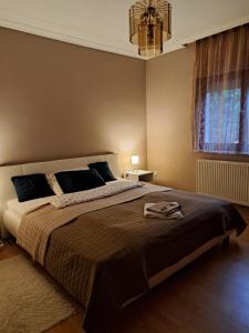 A bed or beds in a room at Villa Csilla elegant house