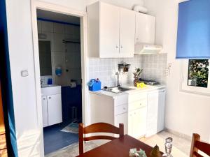 Dapur atau dapur kecil di Panorama Melina Apartments