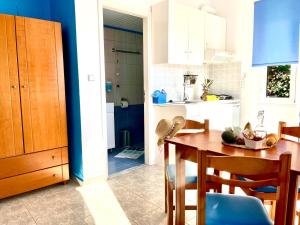 Dapur atau dapur kecil di Panorama Melina Apartments