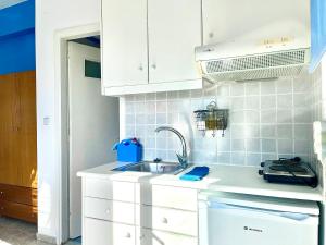 Dapur atau dapur kecil di Panorama Melina Apartments