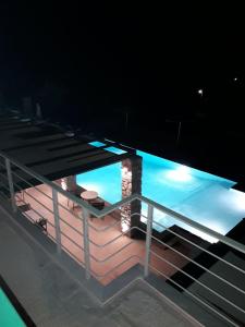 a view of the water from the deck of a house at Karinta Bay Apartments in Chios