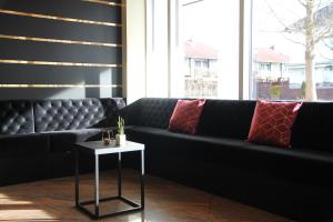 Posezení v ubytování Abasto Hotel Eichenau