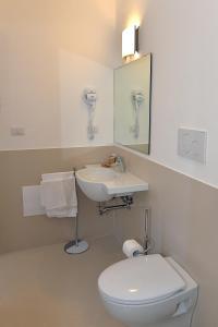 Ванная комната в Tizi Apartments Corso Reginna +26 фотографий