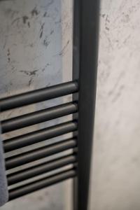a close up of a window with a black shutter at Sea View Luxury Apartment 3 bedrooms Free Parking - By Coast Apartments in Arbroath