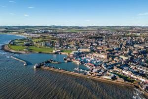 an aerial view of a harbor on the water at Sea View Luxury Apartment 3 bedrooms Free Parking - By Coast Apartments in Arbroath