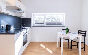 Kuchyň nebo kuchyňský kout v ubytování Homely