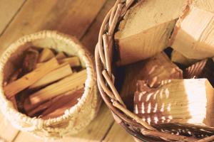 a basket filled with food on a wooden table at Mushroom Yurt in Aberystwyth