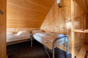 Postel nebo postele na pokoji v ubytování Vakantiehuis Cerny Dul 38