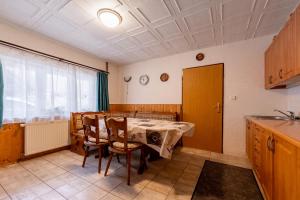 Kuchyň nebo kuchyňský kout v ubytování Vakantiehuis Cerny Dul 38
