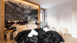 Łóżko lub łóżka w pokoju w obiekcie Aparthotel Delta Top