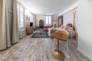 Coin salon dans l'établissement Résidence Aristide Briand - Appartements en Centre Ville