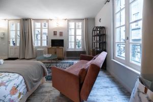 Coin salon dans l'établissement Résidence Aristide Briand - Appartements en Centre Ville