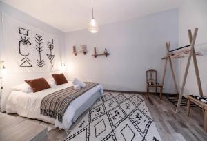 Un ou plusieurs lits dans un hébergement de l'établissement Résidence Aristide Briand - Appartements en Centre Ville