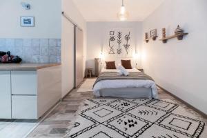 Un ou plusieurs lits dans un hébergement de l'établissement Résidence Aristide Briand - Appartements en Centre Ville