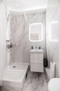 Salle de bains dans l'établissement Résidence Aristide Briand - Appartements en Centre Ville