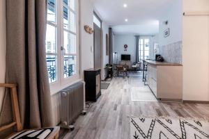Coin salon dans l'établissement Résidence Aristide Briand - Appartements en Centre Ville