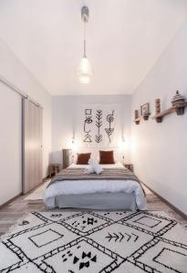 Un ou plusieurs lits dans un hébergement de l'établissement Résidence Aristide Briand - Appartements en Centre Ville