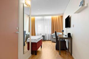 Televiisor ja/või meelelahutuskeskus majutusasutuses Best Western Hotell Lerdalshoejden