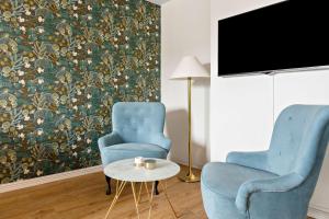 Televiisor ja/või meelelahutuskeskus majutusasutuses Best Western Hotell Lerdalshoejden