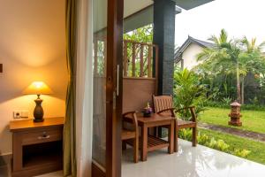 Un jardín fuera de Gita Maha Ubud Hotel by Mahaputra-CHSE Certified