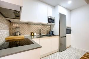 Kuchyň nebo kuchyňský kout v ubytování Casa de Campo Madrid - Apartamento de 2 dormitorios