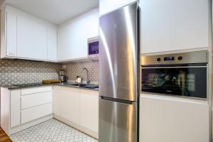 Kuchyň nebo kuchyňský kout v ubytování Casa de Campo Madrid - Apartamento de 2 dormitorios