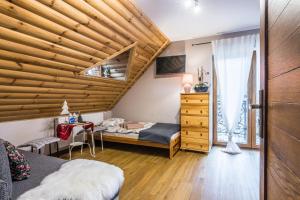 Llit o llits en una habitació de Willa Golasówka