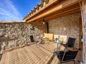 Posezení v ubytování El Forn de Freixenet con servicios de un hotel