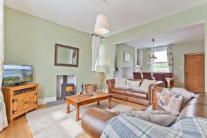 TV a/nebo společenská místnost v ubytování Vine Tree Cottage Coniston