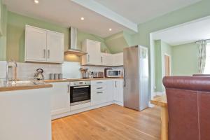 Kuchyň nebo kuchyňský kout v ubytování Vine Tree Cottage Coniston