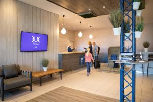 eine Darstellung der Lobby einer Sonnenklinik in der Unterkunft TUI BLUE Sylt in Rantum + 37 Fotos