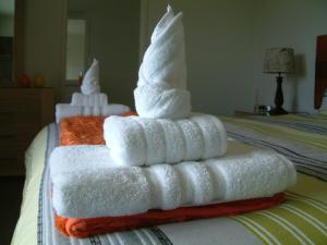 Uma cama ou camas num quarto em Baywaterviews