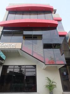 a building with a sign on the side of it at Constrell Pension House in Tagbilaran City