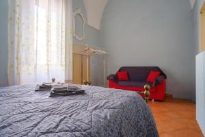 Letto o letti in una camera di I colori di civico 19
