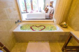 Un baño de Gita Maha Ubud Hotel by Mahaputra-CHSE Certified