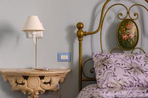 Letto o letti in una camera di I colori di civico 19