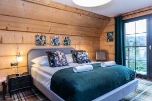 Posteľ alebo postele v izbe v ubytovaní udanypobyt Dom VALLEY VILLA