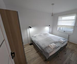 Posteľ alebo postele v izbe v ubytovaní Apartament Cieplice Jadwigi 10