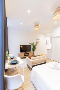 Posteľ alebo postele v izbe v ubytovaní Luz - Appartement hyper centre Saint-Etienne