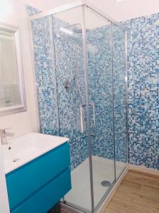 a bathroom with a shower and a sink at Francarooms in Florence +6 photos