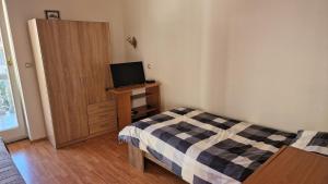 Posteľ alebo postele v izbe v ubytovaní Simple 3-room apartment