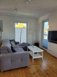 TV a/nebo společenská místnost v ubytování 4 Sterne Dtv Floating House + 16 fotografií