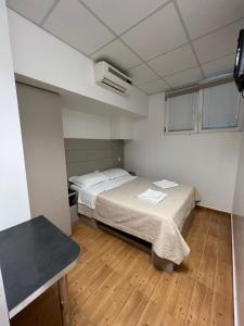 Postel nebo postele na pokoji v ubytování Apartments Villa Simoni