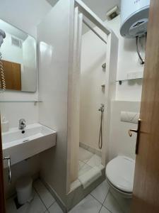 Koupelna v ubytování Apartments Villa Simoni