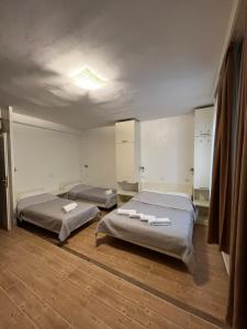 Postel nebo postele na pokoji v ubytování Apartments Villa Simoni