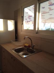 Kuchyň nebo kuchyňský kout v ubytování Sky Loft